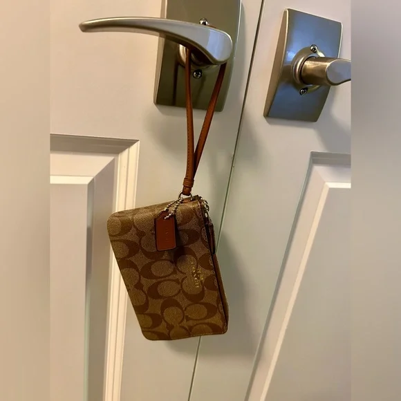 Coach Wristlet in Signature Canvas. - Picture 9 of 10